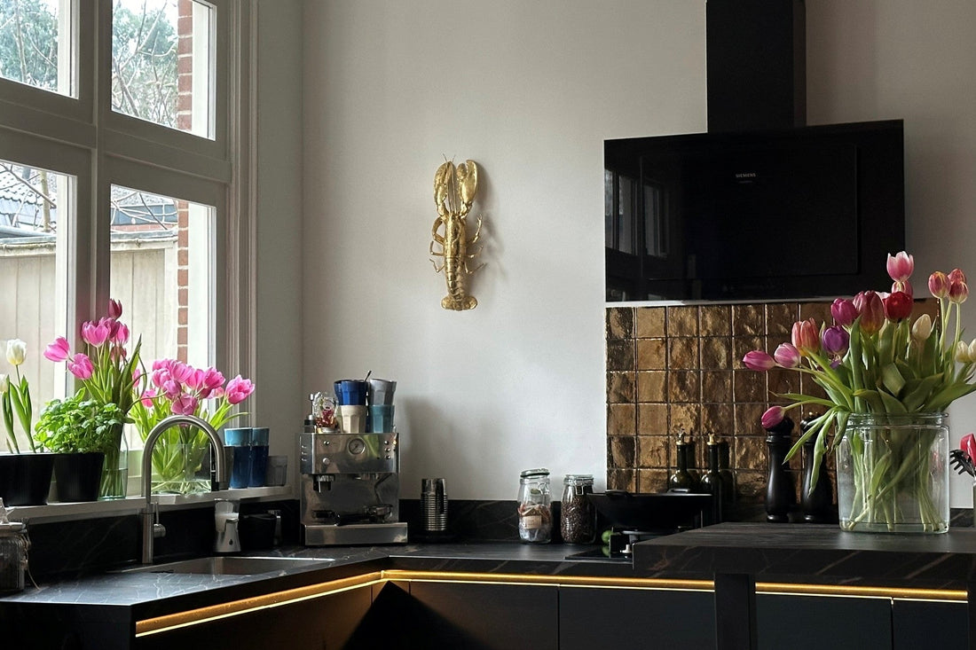 Wat kan ik aan de muur in mijn keuken hangen?